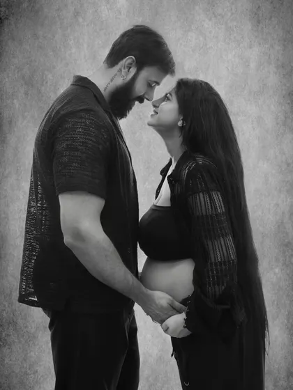 There is a unique connection between a couple as they await their child. I focus on capturing that raw emotion and anticipation in timeless black and white couple portraits.