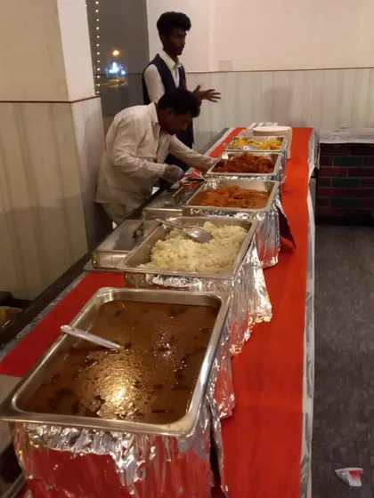 Here is a look at one of our buffet setups for a dinner event. We provide a full spread of our dishes in professional chafing dishes, ensuring the food stays hot and is presented beautifully for your guests to enjoy.