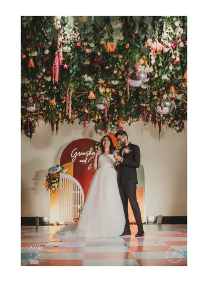 A duplicate of 354, showcasing the full effect of the stunning floral ceiling and boho-chic backdrop.