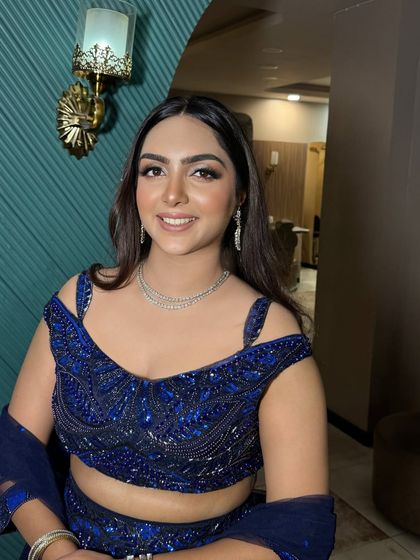 Her happy smile says it all. We love creating looks that make our clients feel this beautiful.