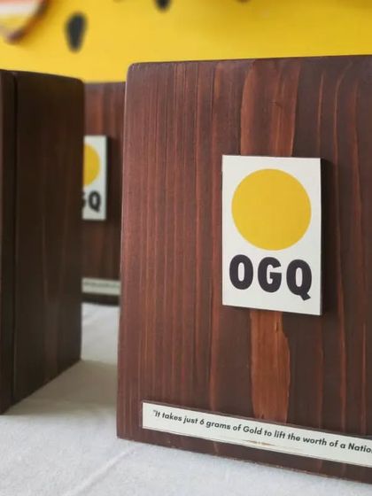 A close-up of the OGQ shadow boxes, showing the beautiful grain of the wood and the clean, professional finish of these special mementos.