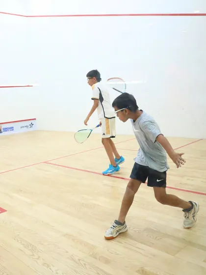 Young players showcasing their skills during the quarter-finals. We provide a professional platform for junior athletes to gain valuable competitive experience.