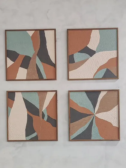 I love exploring texture in my work. This set of four custom canvases uses raised textures and an earthy color scheme of terracotta, slate, and sage to create a tactile and visually engaging abstract composition.