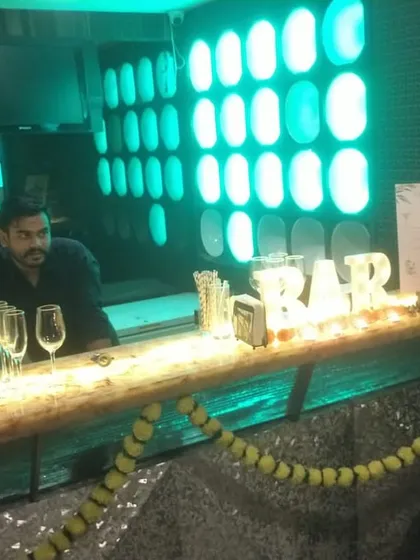 Another angle of our Diwali bar setup, showing how we integrate traditional decor with our modern, LED-lit bar.