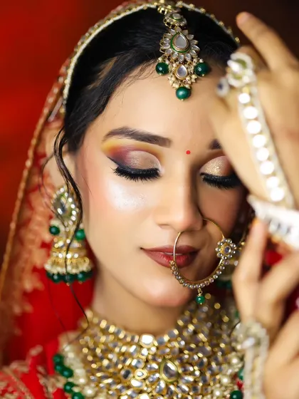 Mastering the classic Indian bridal look is a cornerstone of our curriculum. Here, our students perfected a radiant, HD-ready finish with a dramatic smokey eye and flawless skin, a look that is timeless and in high demand.