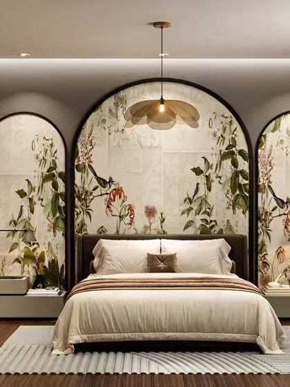 This bedroom features a unique, artistic headboard with three arched panels showcasing a beautiful floral and bird motif. The design is complemented by a petal-shaped pendant light, creating a serene and nature-inspired ambiance.