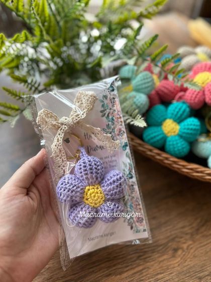 A purple puff flower keychain, individually packaged with a custom card. We love preparing these for special orders and events.