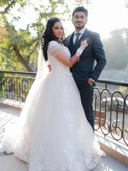 The happy couple, ready for their future. Her makeup is timeless, ensuring these photos will be cherished for a lifetime.