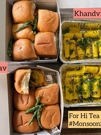 A monsoon special hi-tea order of classic Vada Pav and delicate Khandvi rolls.