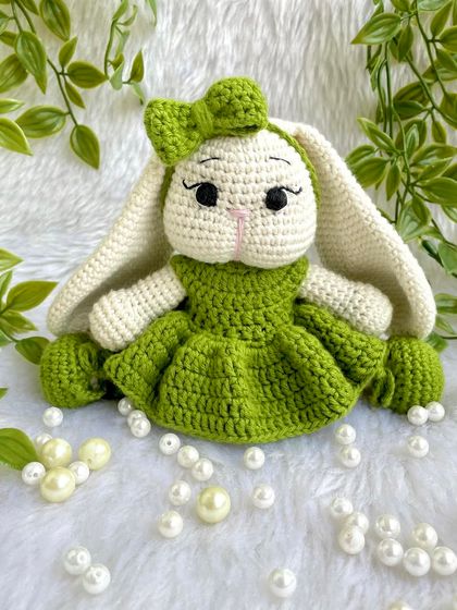 Look at this adorable bunny with her long, floppy ears and sweet green dress! I love when customers have unique ideas, and this long-eared bunny was a joy to bring to life. She is so soft and posable.