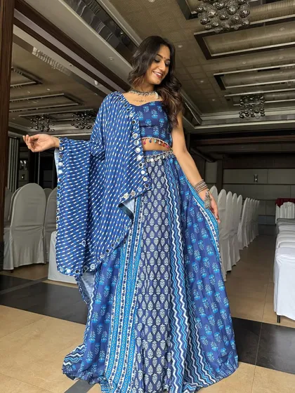 A full-length view of this stunning Navratri outfit. The makeup is designed to be both beautiful and long-lasting for a night of dancing and festivities.