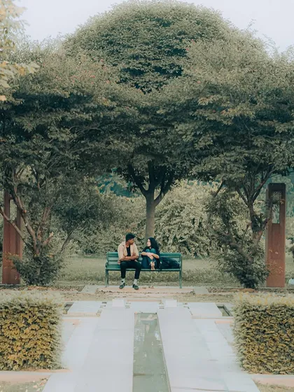 A quiet moment during a relaxed couple photography session at Sunder Nursery. I use wide shots like this to show the connection between people and the beautiful spaces they're in, creating a feeling of peaceful intimacy.