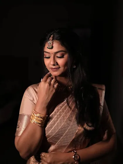 A beautiful, glowing look for this bride-to-be's engagement. The makeup is subtle, with a focus on highlighting her natural features.