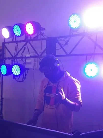 In my element at an indoor birthday party. A compact setup with professional lighting is all I need to turn any space into a dance floor.
