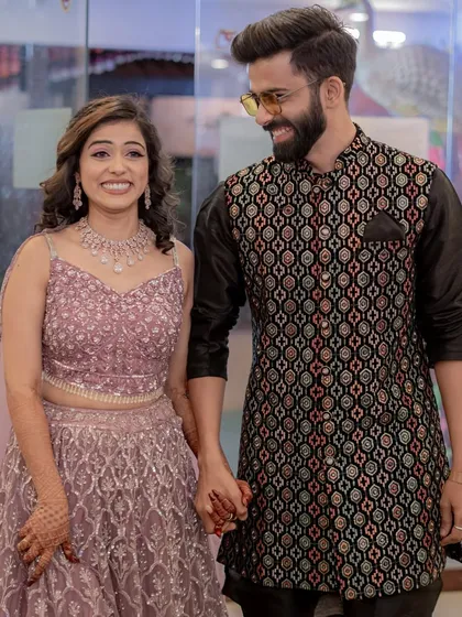 A candid shot of the happy couple, ready to hit the dance floor.