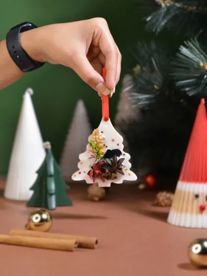 Decorate your tree with more than just lights. This scented Christmas ornament, shaped like a tree and decorated with spices, adds a festive scent to your home.
