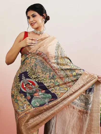 A saree with a beautiful print depicting a Kathakali dancer, a tribute to the rich culture of Kerala.