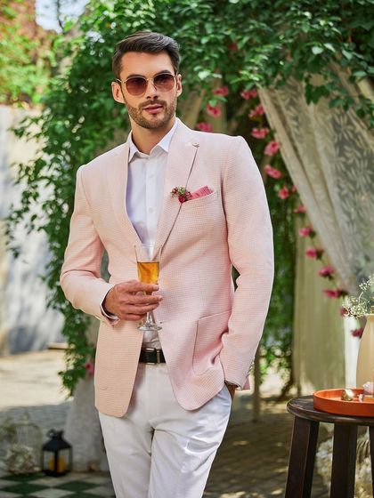 The Rose Quartz linen jacket is my top suggestion for the modern groom squad. It's a memorable color that photographs beautifully and sets a celebratory tone.