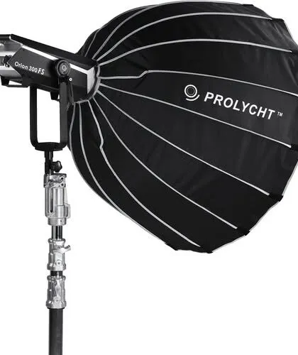 Introducing the Prolycht Orion 300 FS, a compact but powerful full-spectrum LED light. It features an RGBACL engine for precise color and comes with accessories like a parabolic softbox and projection lens.