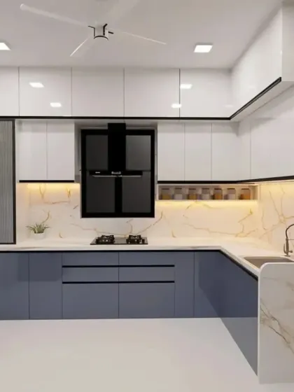 The same kitchen design, shown here with a stylish navy blue and white color scheme. We can customize the colors to perfectly match your personality.