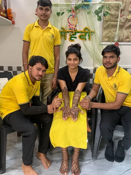 The bride with our artists after her mehndi session. We are proud to be a part of her wedding preparations.