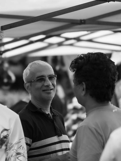 Attendees networking and catching up at the Garage Sale. It's a hub for the Bangalore fitness community.