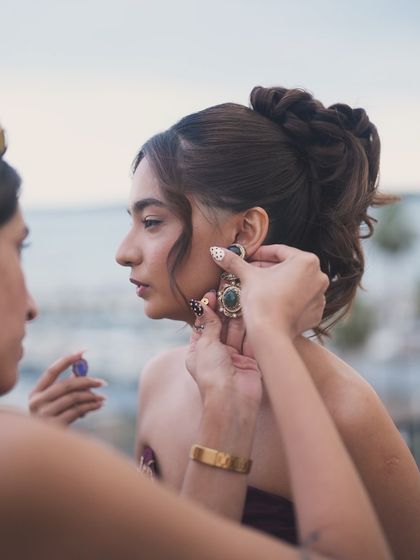 The final touches. Me putting on Anushka's earrings just before she heads out to the Cannes red carpet. These little moments of focus are a crucial part of the process.