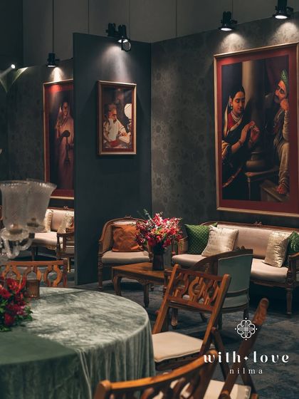 A wider view of the seating arrangement, showing how the different elements come together to create a rich, layered, and cohesive design. The space feels both grand and intimate.