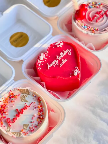 Another view of the birthday bento set, showing how different designs and shapes can come together to create a cohesive and festive dessert spread.