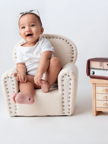 Another angle from our fun retro-themed baby shoot. This little one is ready to rock and roll!