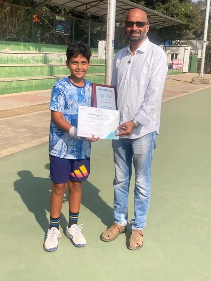 Arjun Dua with his certificate and trophy after becoming the Runner-Up in the Boys Under-12 Singles at the prestigious National Series Tournament in Rajkot.