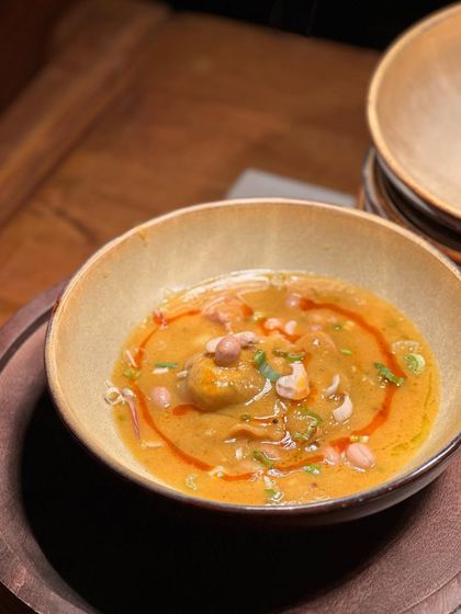 A traditional Indian curry, plated with a modern touch. We respect the roots of every recipe while elevating its presentation to match a luxury setting.