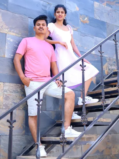 A stylish pose on a modern staircase. Even our casual shoots have an element of fashion and style.