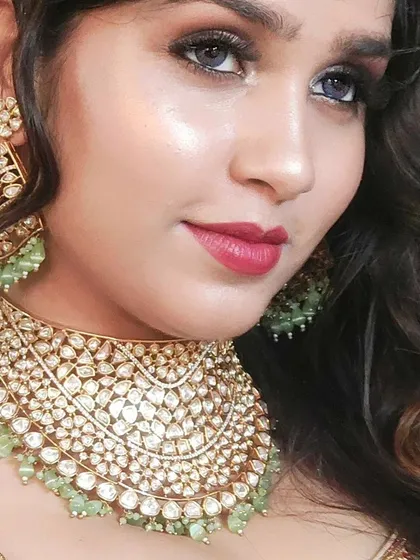 A close-up of a beautiful mint green and Polki choker. The soft color and intricate design make it a perfect choice for a day wedding.