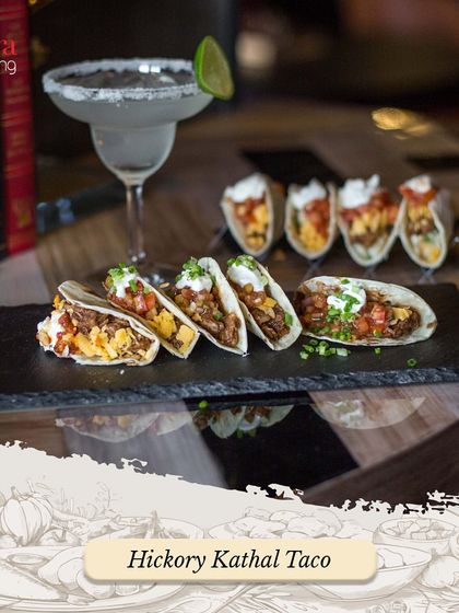 Hickory Kathal Tacos offer a creative vegetarian take on the Mexican classic. The smoky jackfruit filling provides a meaty texture and is paired with fresh toppings.