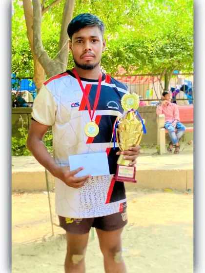 Another one of our champions with his first-place medal and trophy.