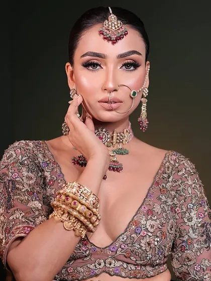 A powerful portrait of the bride, showcasing her confidence and the beauty of her unconventional bridal jewellery.