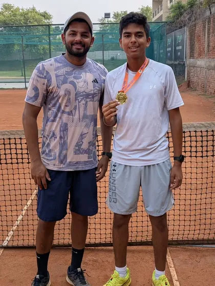 Arsh Kathuria celebrating his win at the Delhi Games 2025 event in the Boys U14 Singles category. He dominated the final with an 8-0 victory.