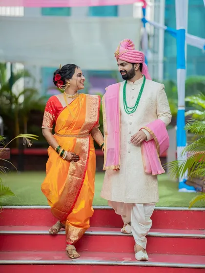 Here is my bride looking radiant in a traditional orange Navari saree. I offer full draping services to make sure the saree is not only beautiful but also comfortable to walk and move in throughout the ceremony.
