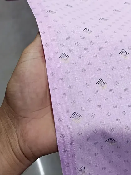 A high-quality kurta fabric with a subtle pink geometric print. This material is very comfortable and breathable, ideal for hot climates.