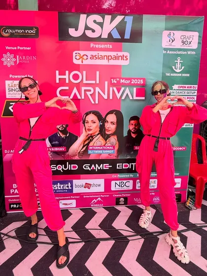 Double trouble, double the love! Here we are at a Holi Carnival in Indore, sending a heart to the amazing crowd. We bring the twin energy to every performance.