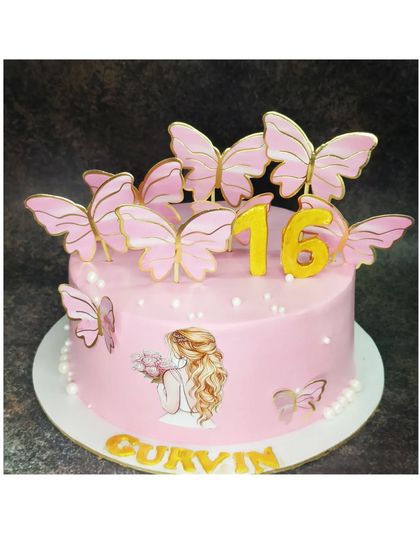 A sweet 16th birthday cake with a choco-vanilla flavor. The design is decorated with pink butterflies and a pretty girl topper for a special milestone.