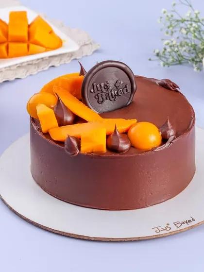 During mango season, I offer a variety of flavor combinations. This picture shows my Chocolate Mango cake, a rich and tropical treat that perfectly balances deep chocolate with sweet, fresh mango.