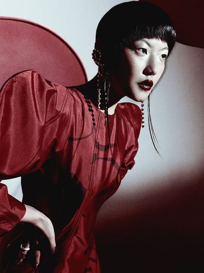 A dramatic shot from a Lovebirds Studio campaign, where I handled styling and direction. The red lighting and puff-sleeve silhouette create a powerful, high-fashion image.