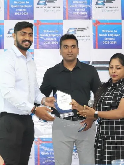 Another shot of Mr. Madhu being presented with the 'Extra Miles' award. It's important for us to recognize those who put in the extra effort.