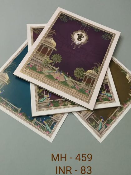 This invitation set features a beautiful design of palace gardens and peacocks, with inserts in multiple rich colors. It's a vibrant and elegant choice for your wedding.
