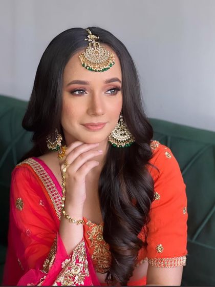 A side profile of the classic soft waves hairstyle. It's an elegant and versatile choice that works for any wedding function.