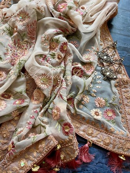 A flat-lay of the dupatta, showing its Mehrab-style jaal design.