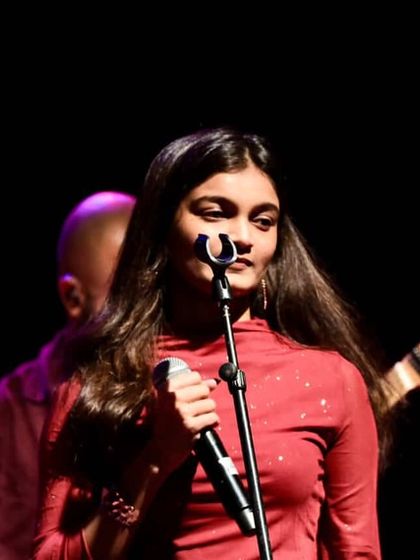 A close-up shot from a concert, feeling every word of the song. I believe in singing from the heart, always.