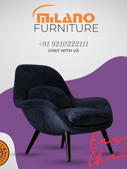 This modern accent chair in a deep navy blue features a sculptural, curved design for a unique look. It's an easy chair that combines artistic form with comfortable seating.